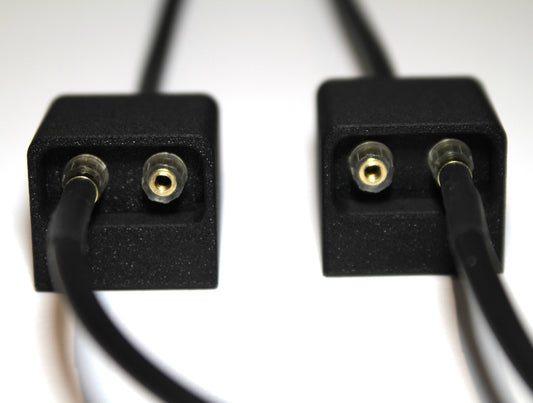Tengill connection boxes with accessory cables plugged into the gold-plated inputs