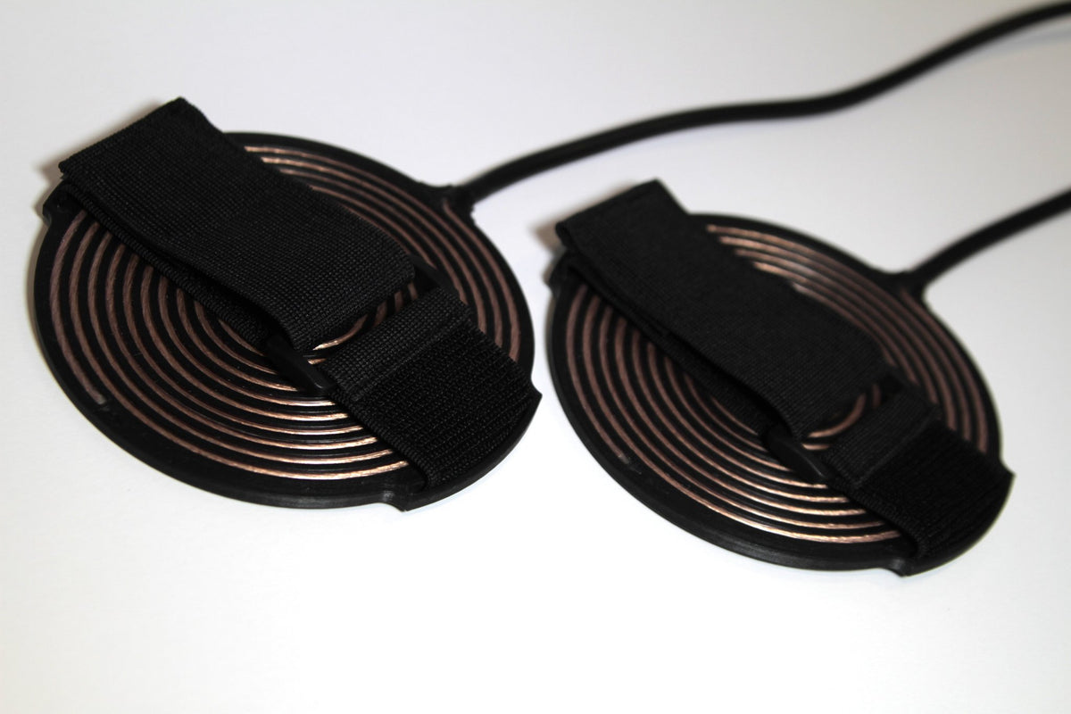 Tvíburi pads with elastic straps fitted, ready to be strapped to forearm, upper arm or calf